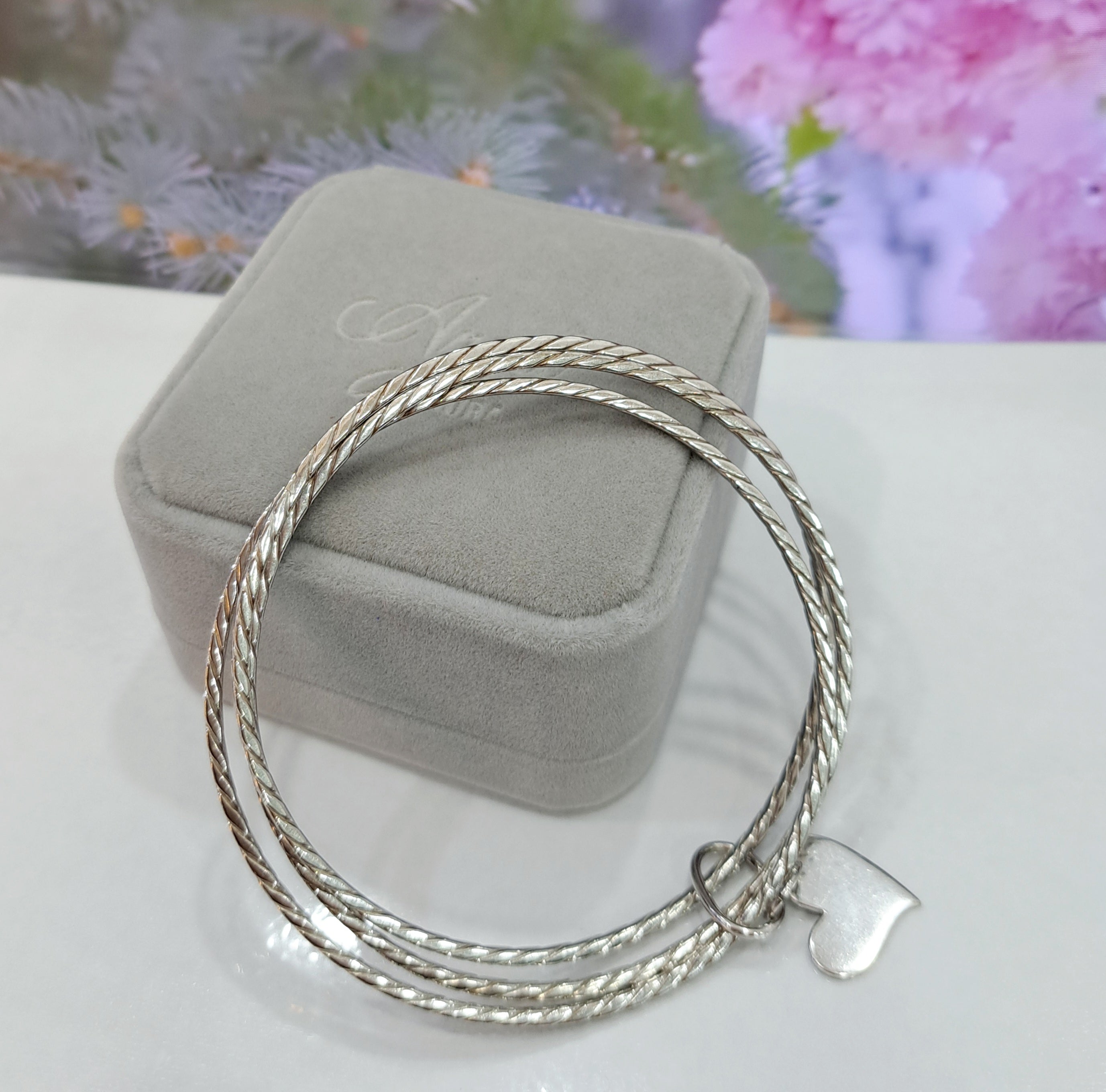 Trinity design with Heart shaped charm Bangle