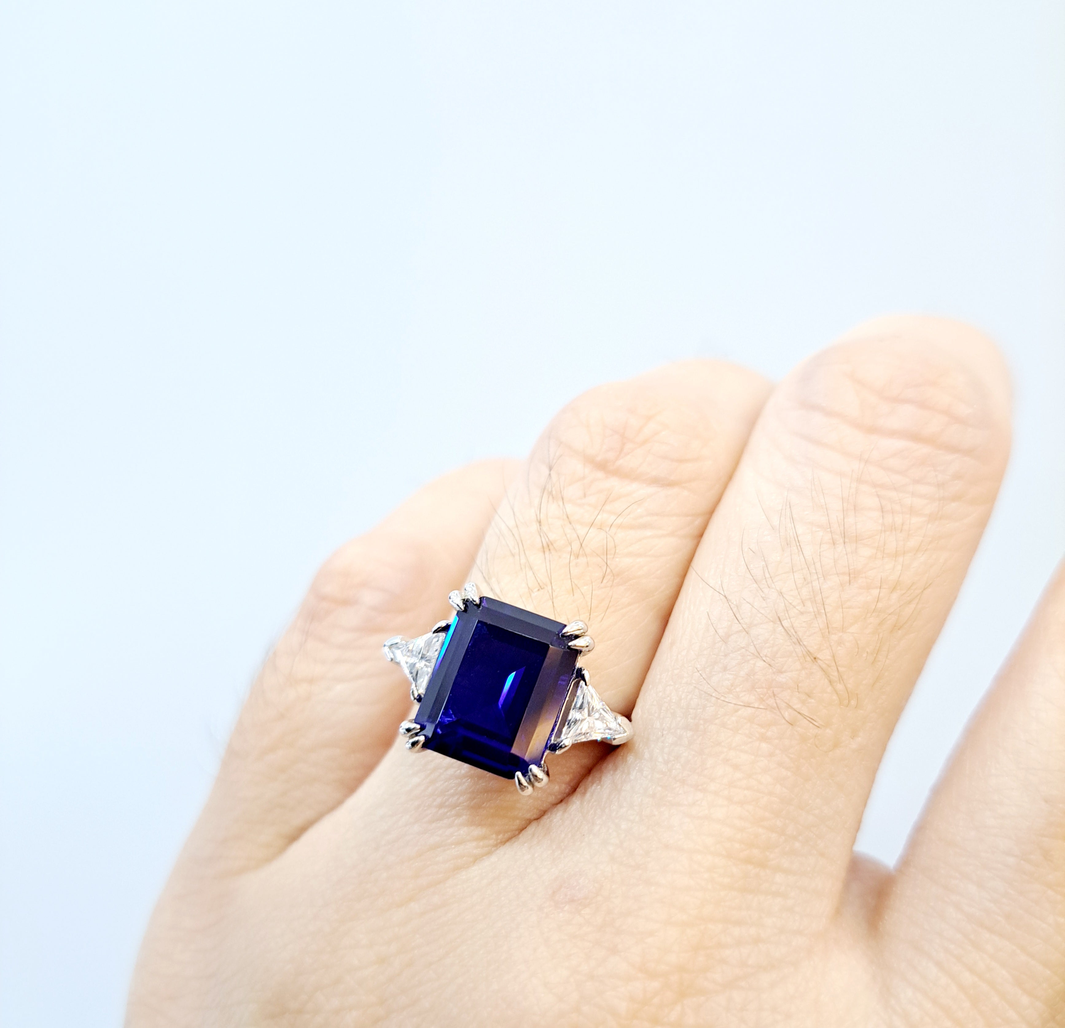 Trilogy Simulated Sapphire with Trilliant Scintilli Ring