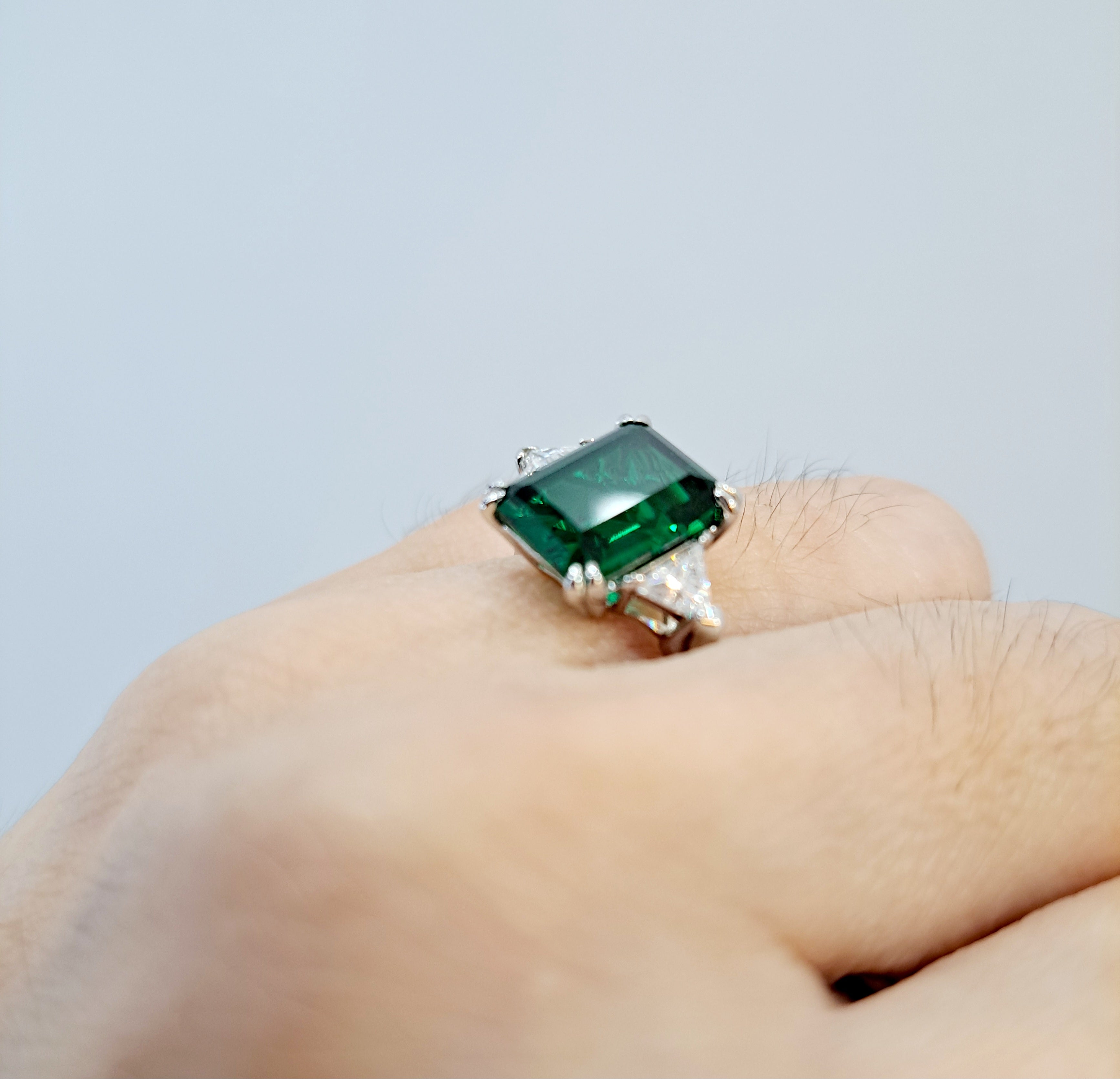 Simulated Emerald with Trilliant Scintilli Ring