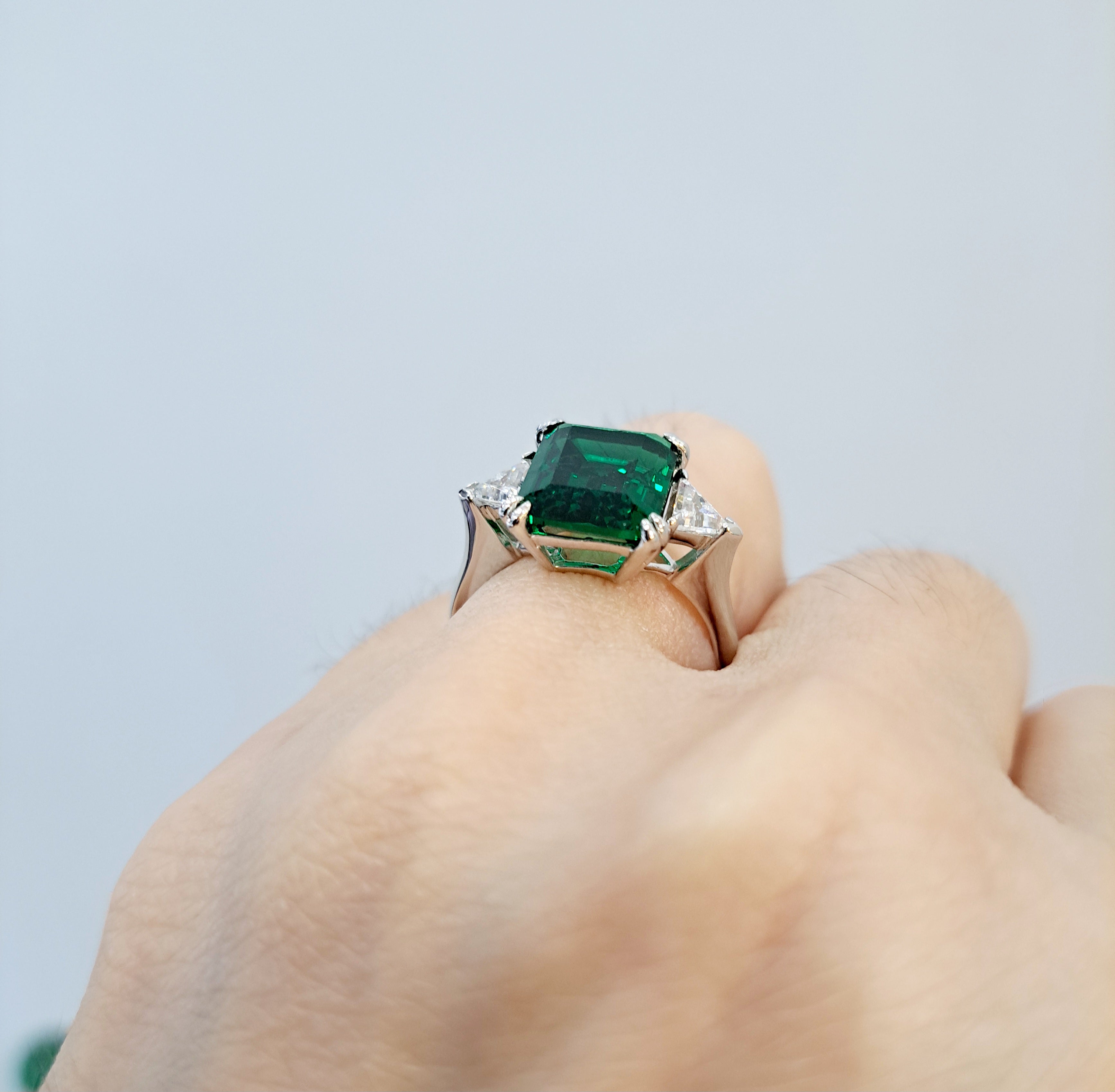 Simulated Emerald with Trilliant Scintilli Ring