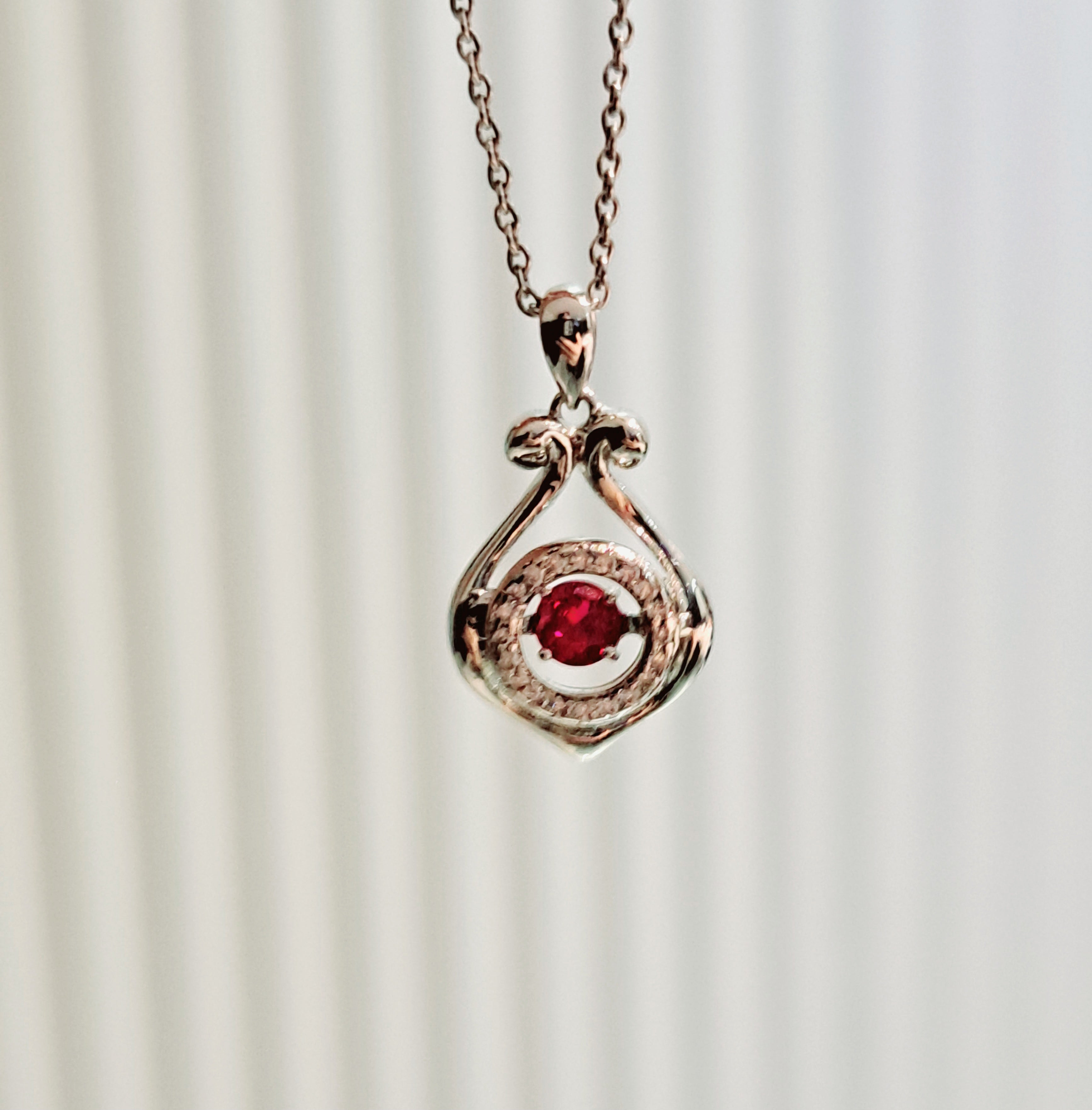 Happy Simulated Ruby Pendant