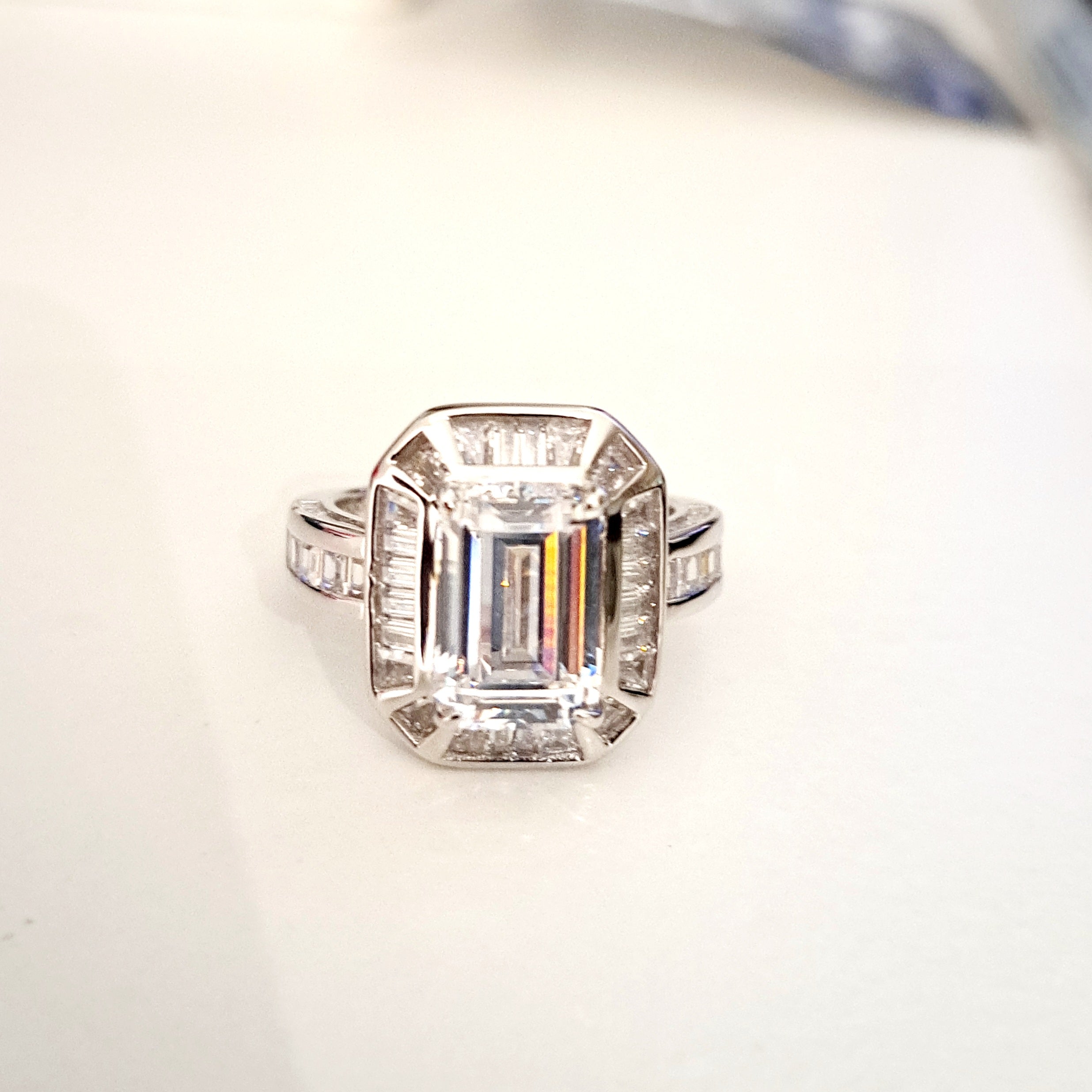 Elegant Emerald cut Scintilli Ring