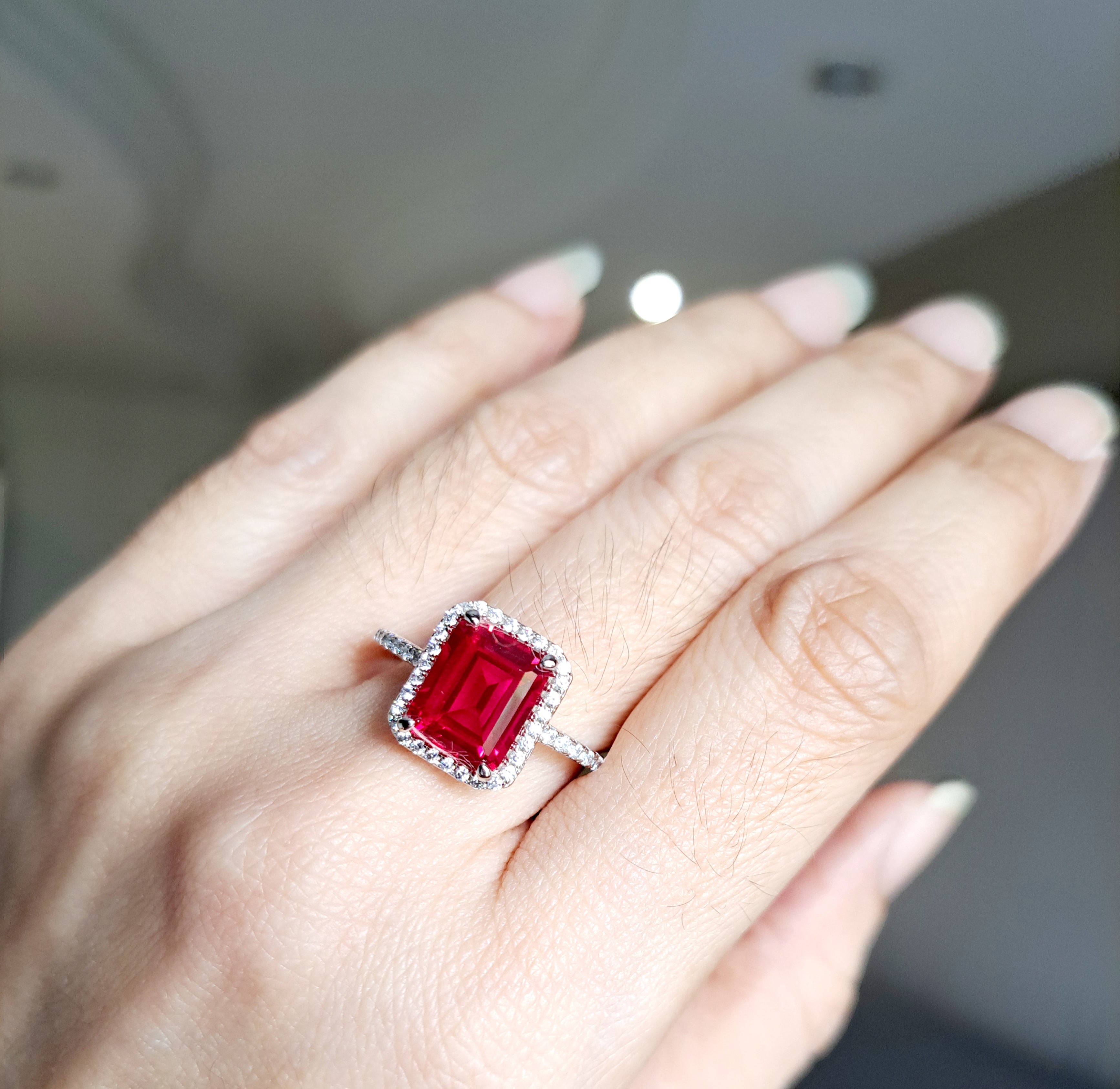 Halo Emerald cut Ruby Scintilli Ring