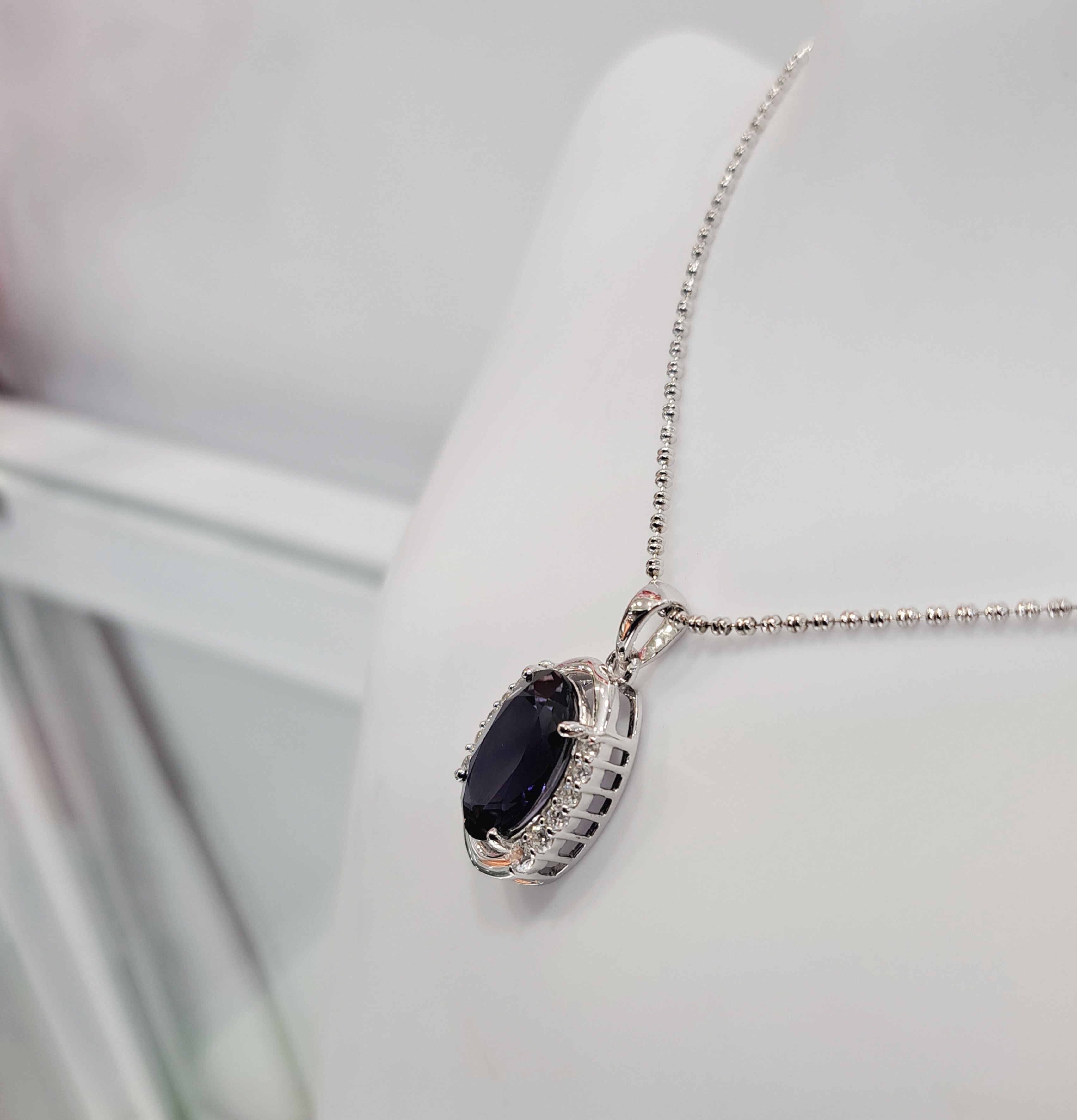 Iolite with scintilli Pendant