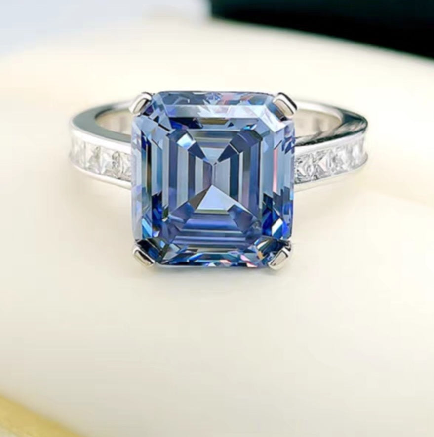 Elegant Simulated Swiss Blue Topaz Ring