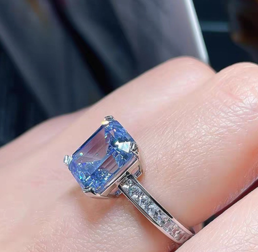 Elegant Simulated Swiss Blue Topaz Ring